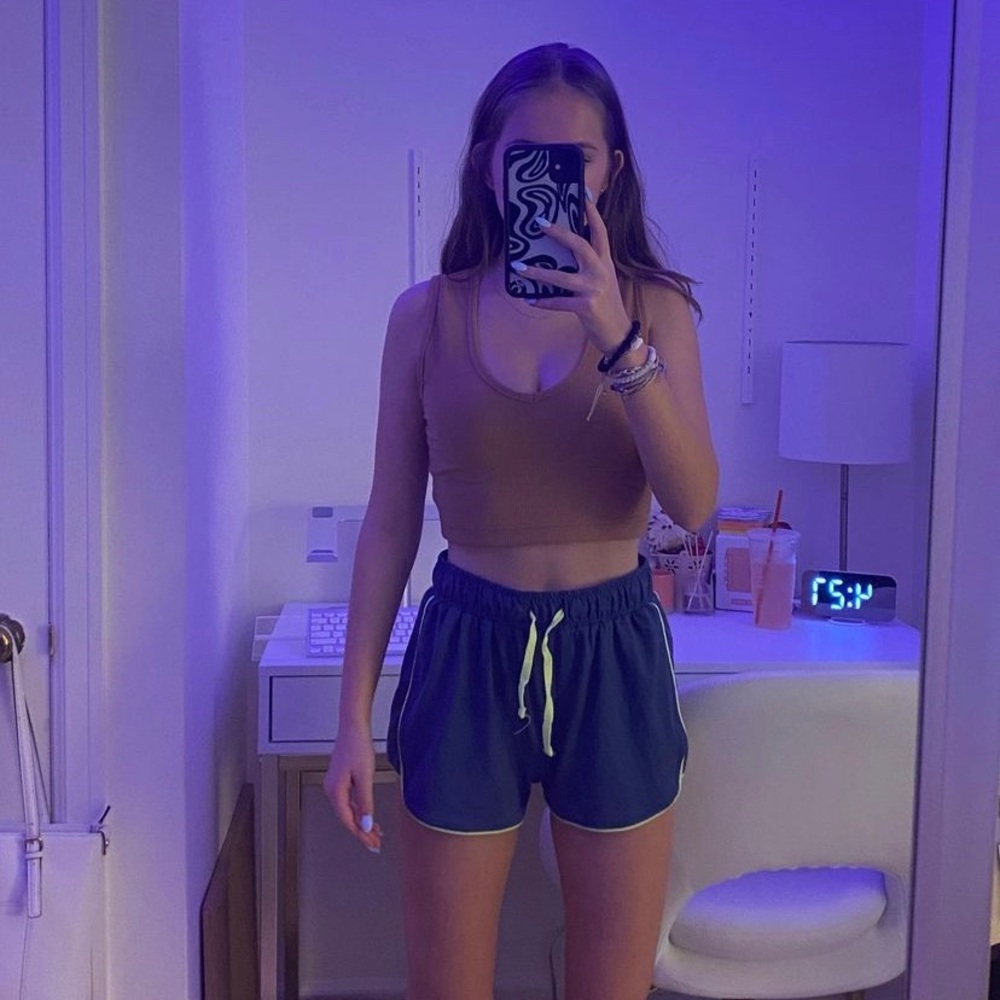 Navy blue shorts with neon yellow outlines